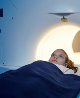 A child undergoing an MRI scan, used to explain pediatric radiology